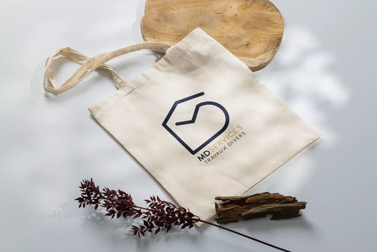 Logo et identité visuelle appliqués sur supports professionnels pour entreprise de travaux en France
